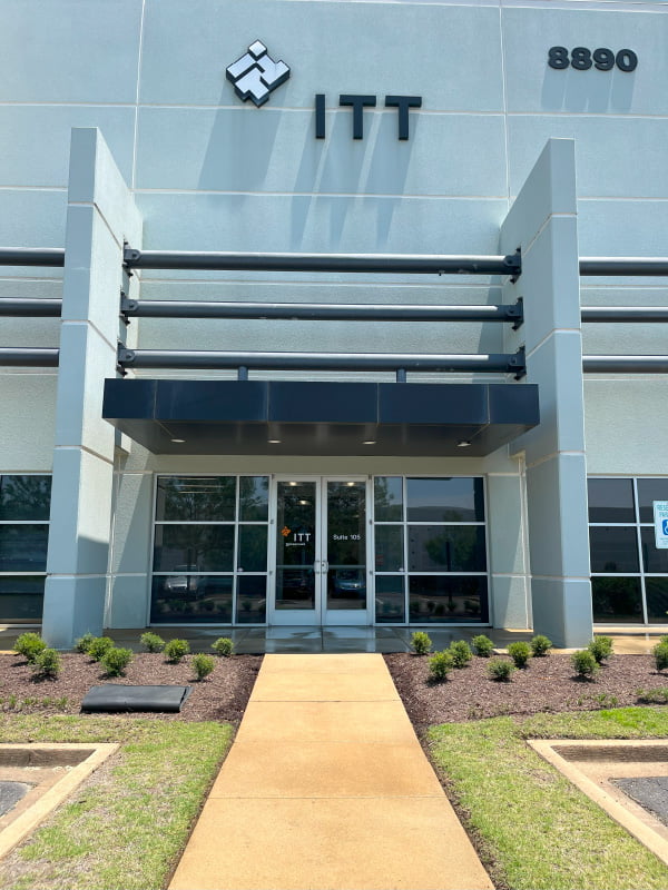 The clean exterior of a commercial building after being pressure washed.