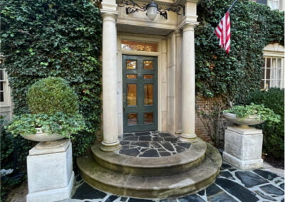 The entrance of a Buckhead family estate before being pressure washed.